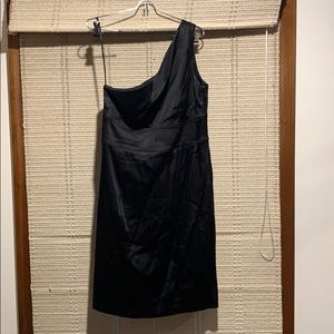 One shoulder black Calvin Klein dress.